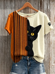 T-shirt à manches courtes pour femme, motif patchwork avec chat noir qui fait coucou et empreintes de pattes