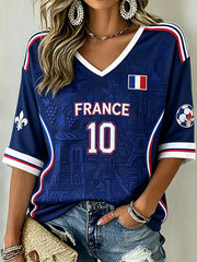 T-shirt à manches mi-longues et col en V pour femme, motif imprimé aux motifs de football dans un design aux combinaisons de couleurs