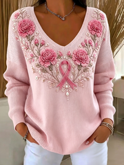 Haut côtelé à col en V avec impression artistique rose sur le thème du cancer du sein chez la femme